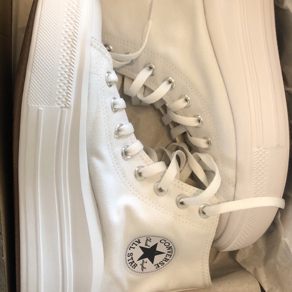 White platformed Converse Chuck Taylor high top